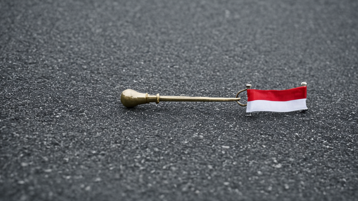 Équipement d’arbitrage avec oreillette et drapeau d’assistant sur un banc.