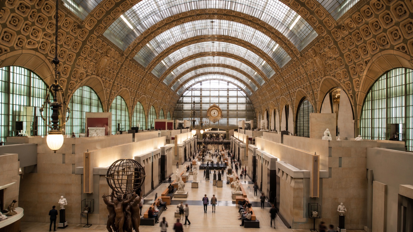 La grande nef du musee d'Orsay sous sa verriere, avec sculptures et visiteurs