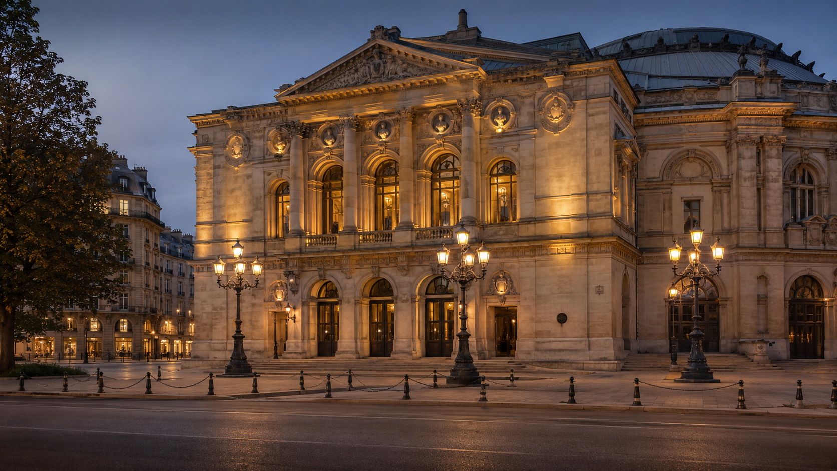 Facade d'un theatre parisien historique illuminee au crepuscule