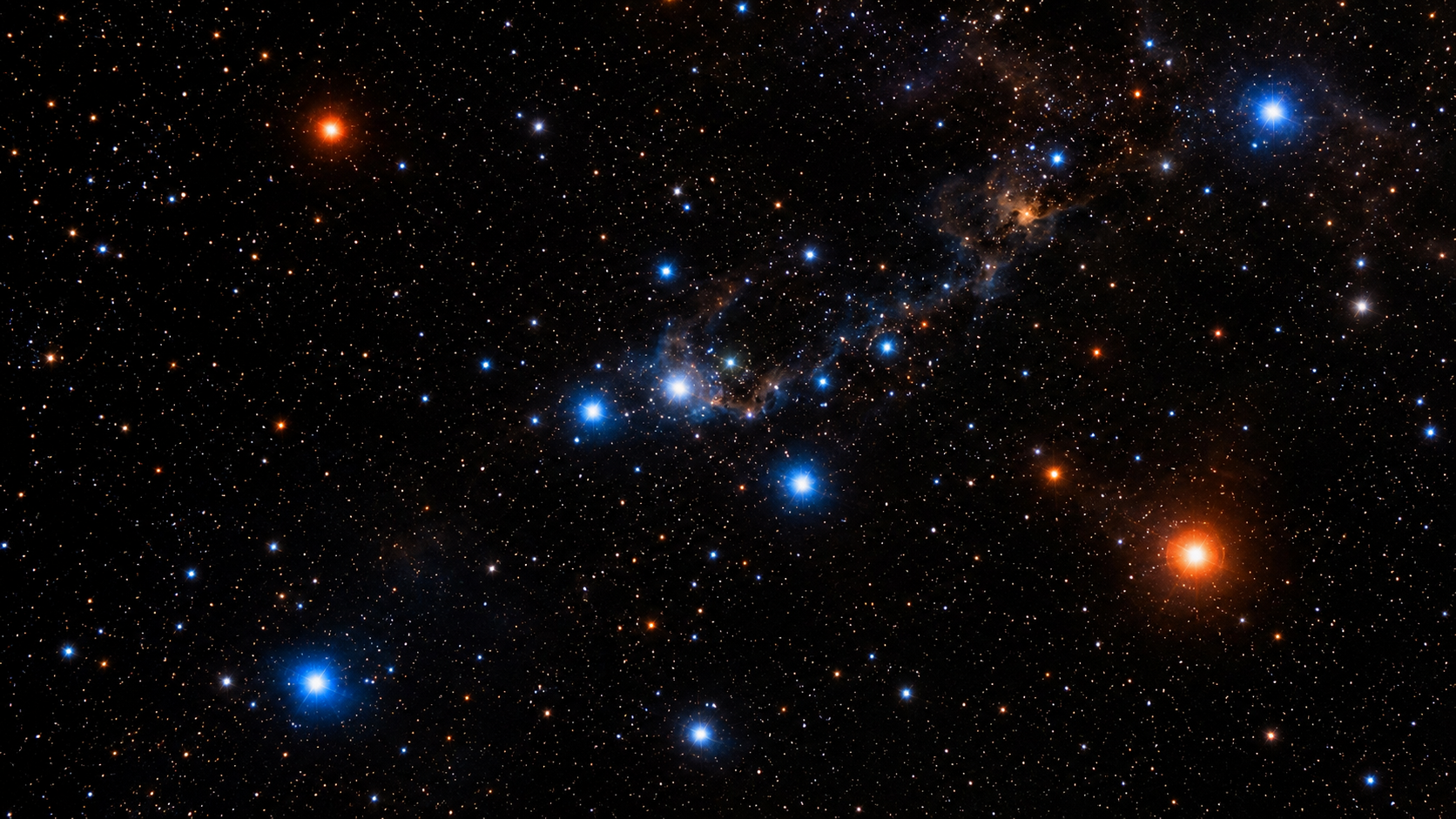Champ d'etoiles melant astres bleus chauds et astres rouges froids sur fond noir.