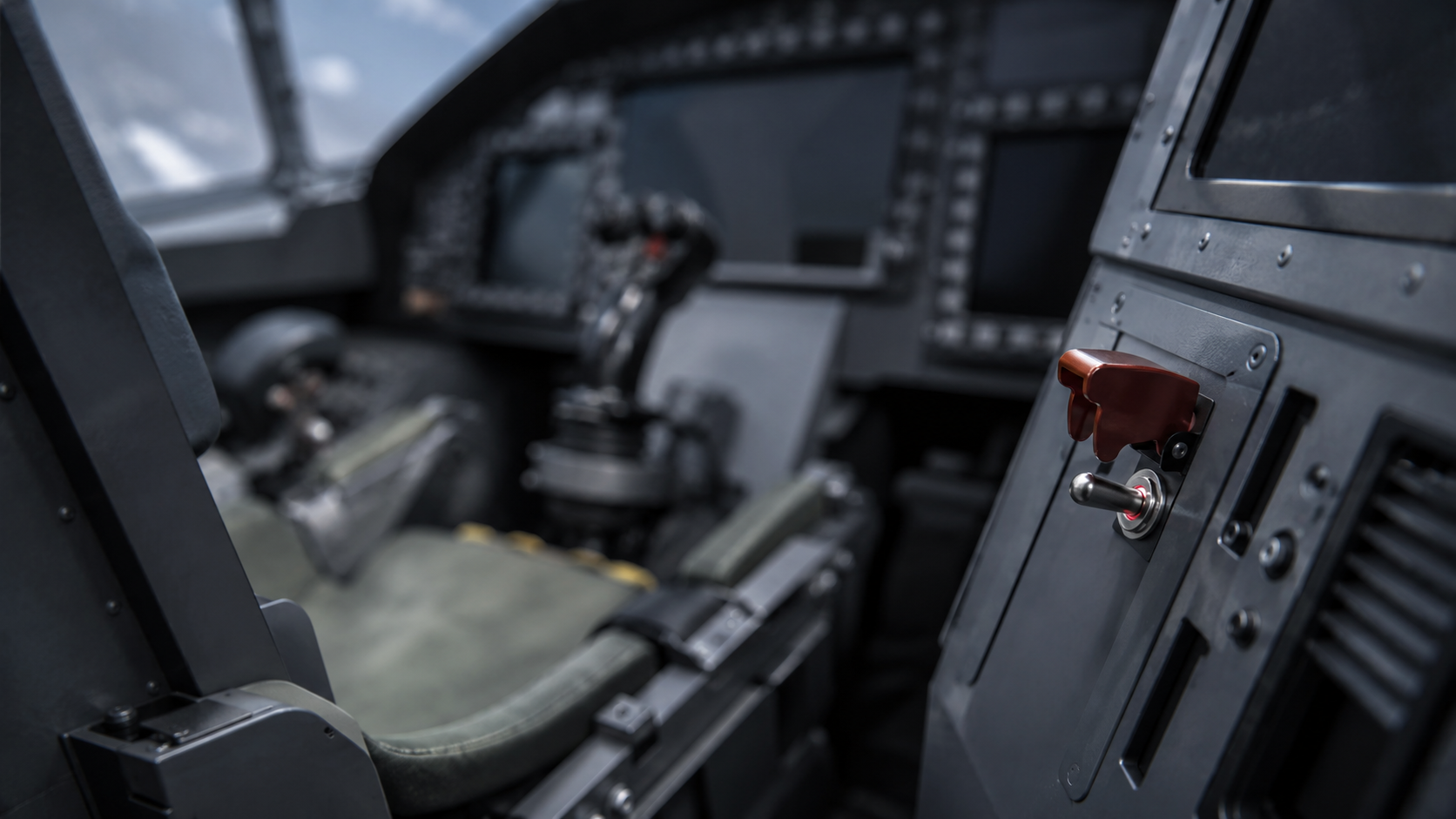 Interieur d'un cockpit de chasseur avec siege de pilote vide et un unique interrupteur sur le tableau de bord