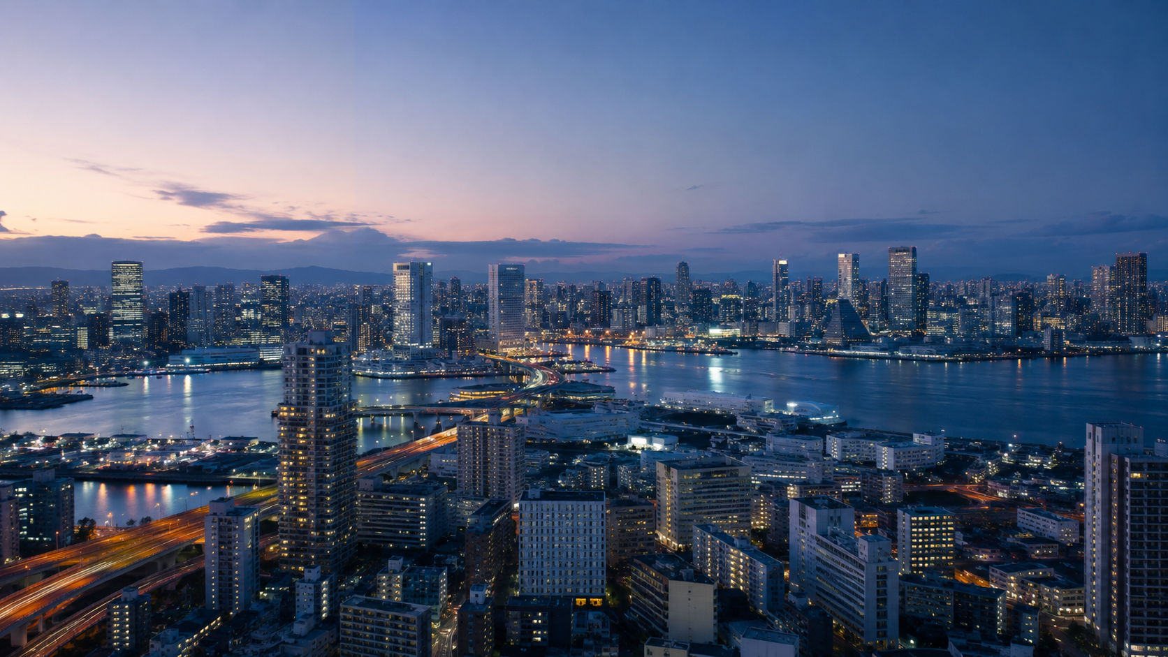 Vue large des gratte-ciel d'une grande métropole japonaise au crépuscule, port et tours, ciel calme.
