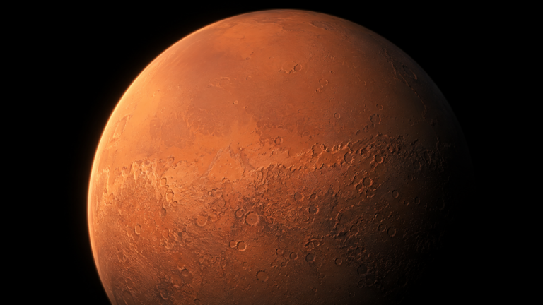 Mars vue depuis l'orbite, avec la frontière nette entre les basses plaines lisses du nord et les hautes terres cratérisées du sud